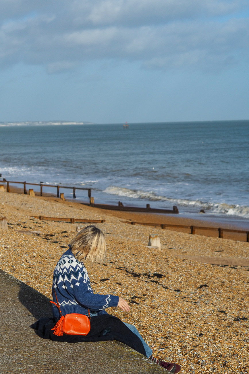 Alexandra Stedman of The Frugality sat at Deal's pebbly beach.
