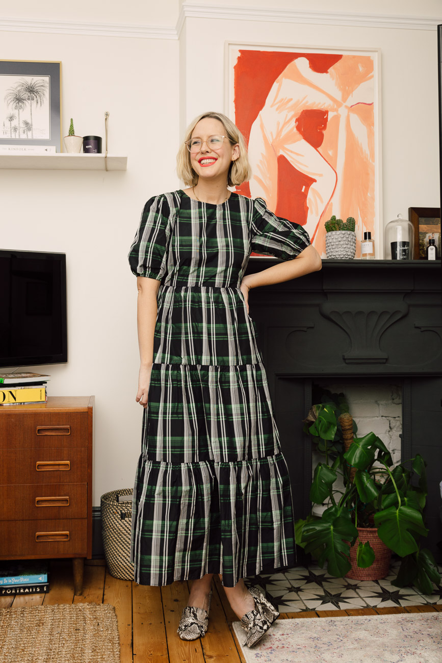 Alex Stedman of The Frugality wearing a green and white checked dress from Topshop.